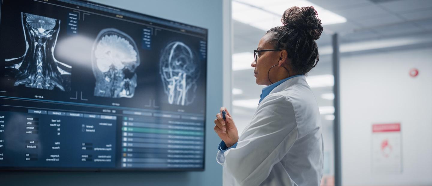 A doctor looking at electronic medical images.